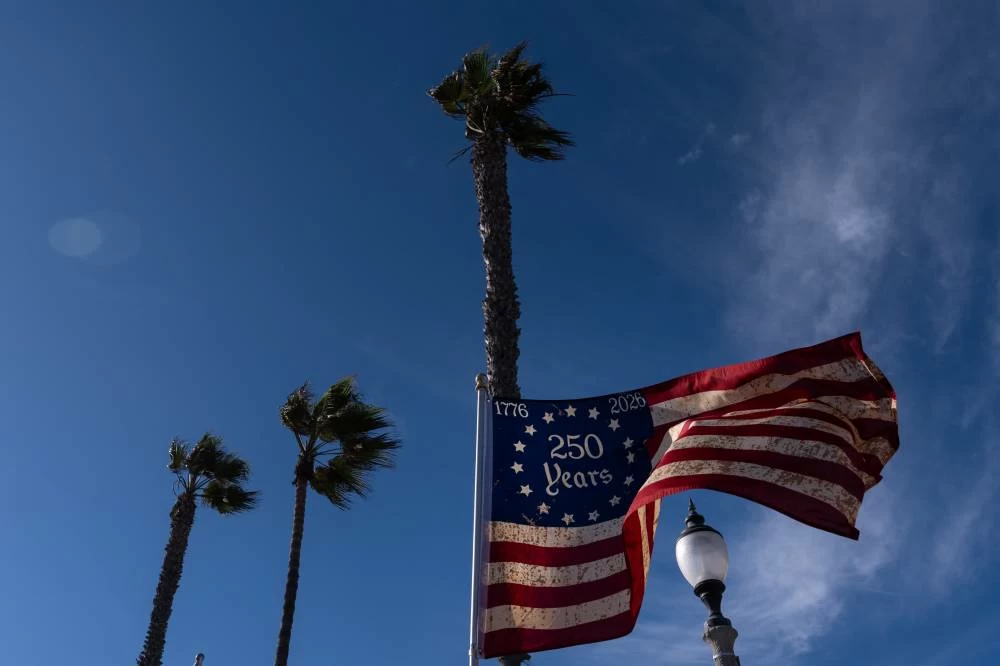 A flag celebrating the 250th anniversary of the adoption of the Declaration of Independence is displayed in Huntington Beach, Calif., Friday, July 3, 2026. (AP)