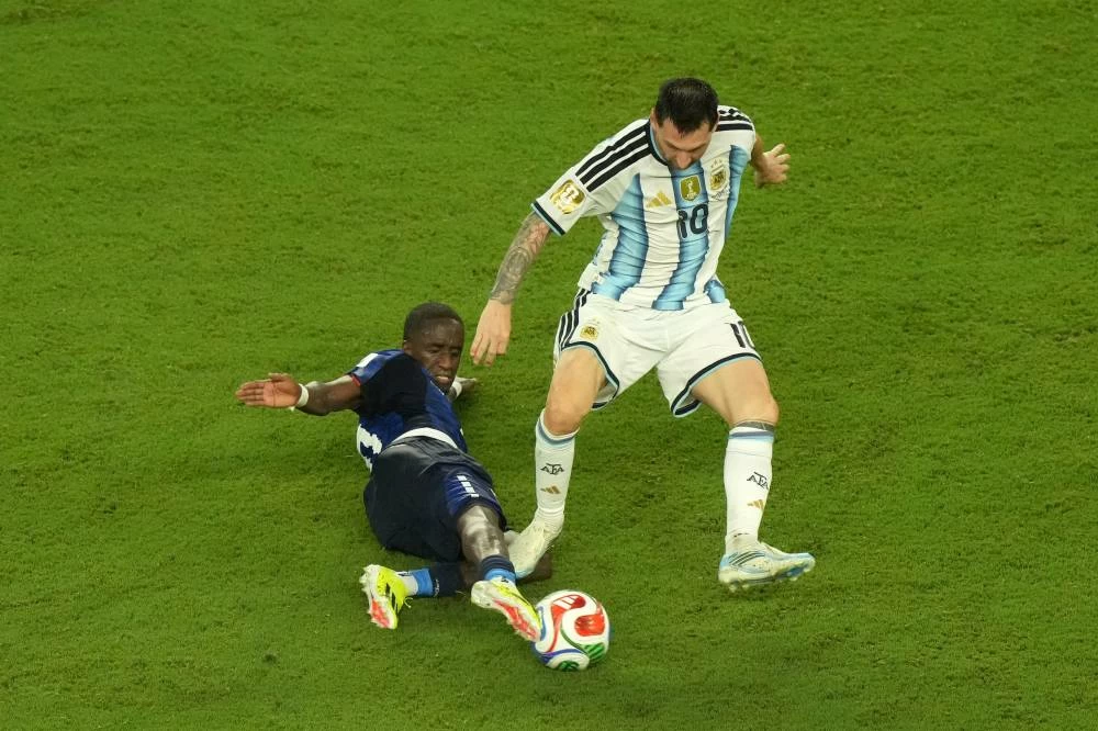 Cape Verde's Jamiro Monteiro (10) challenges for the ball with Argentina's Lionel Messi (10) during the World Cup round of 32 soccer match between Argentina and Cape Verde in Miami Gardens, Fla., Friday, July 3, 2026. (AP)