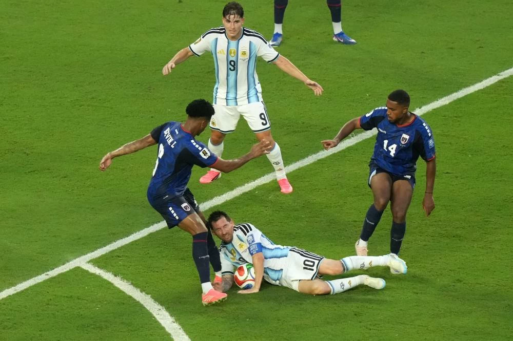 Argentina's Lionel Messi (10) collides with Cape Verde's Kevin Pina (6) during the World Cup round of 32 soccer match between Argentina and Cape Verde in Miami Gardens, Fla., Friday, July 3, 2026. (AP)