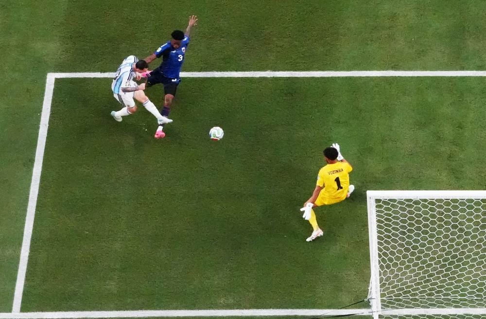 Argentina's Lionel Messi scores their first goal against Caper Verde. (Reuters)
