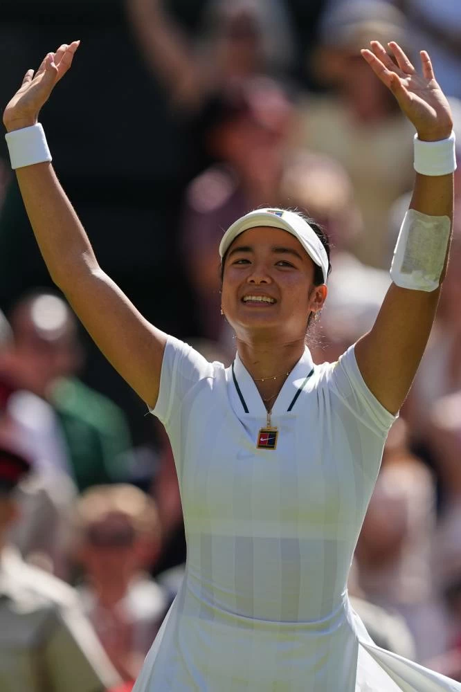 Alexandra Eala of the Philippines celebrates winning the third round women's singles match against Iga Swiatek of Poland at the Wimbledon Tennis Championships in London, Saturday, July 4, 2026.(AP)