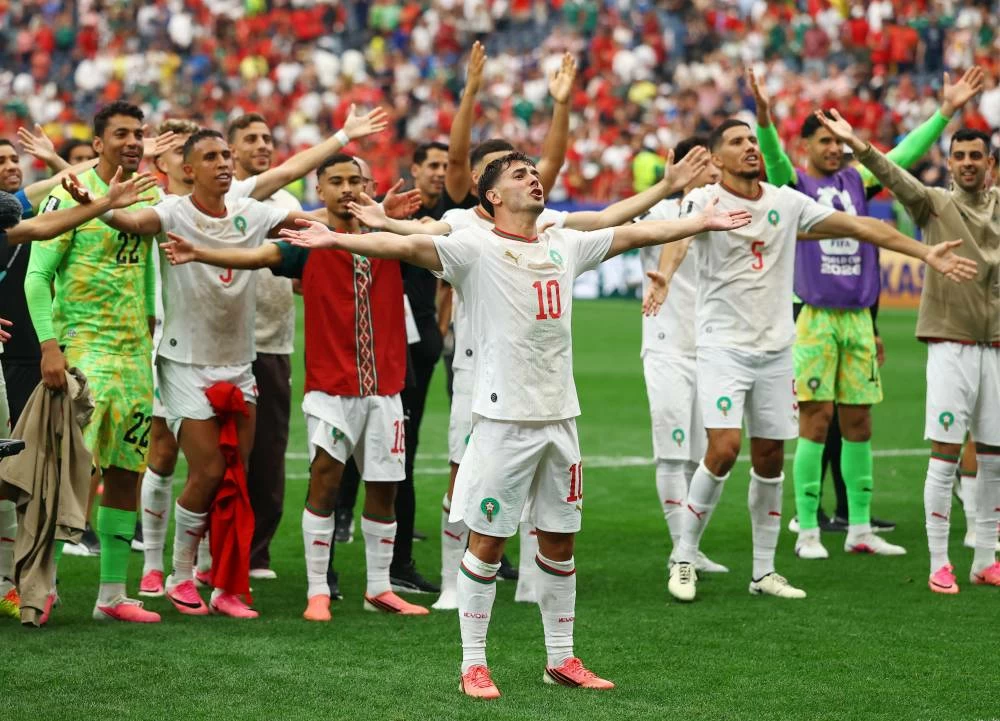 Morocco's Brahim Diaz and teammates celebrate after the match against Canada. (REUTERS)
