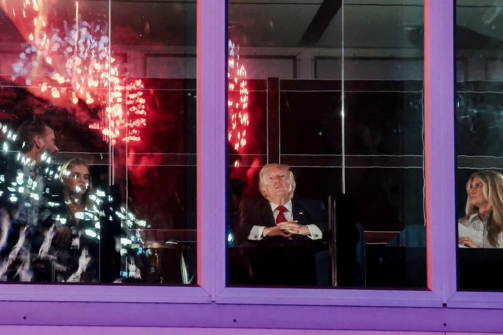 U.S. President Donald Trump and first lady Melania Trump watch fireworks explode during the Freedom 250's Salute to America as the United States celebrates its 250th anniversary on Independence Day, attempting the largest firework display in history with 850,000 fireworks in Washington, D.C., U.S.. REUTERS