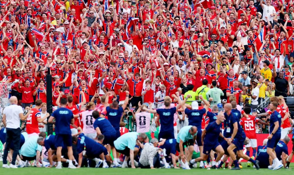 Norway fans celebrate after the match as Norway qualify for the quarter finals of the World Cup REUTERS\