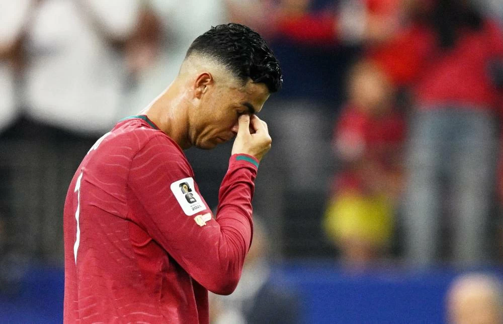 For much of his international career, Ronaldo appeared to carry the weight of Portugal's ambitions on his shoulders. Picture credit: Reuters