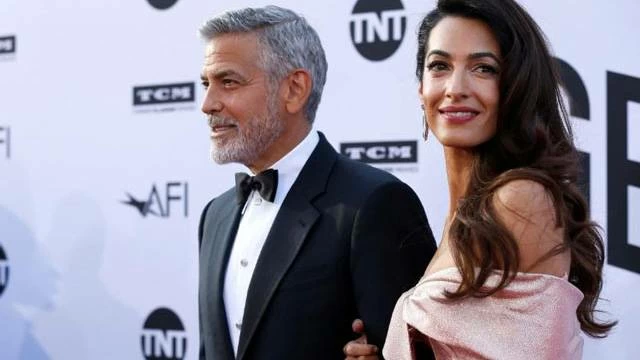 A file photo of Hollywood actor George Clooney and wife Amal Clooney