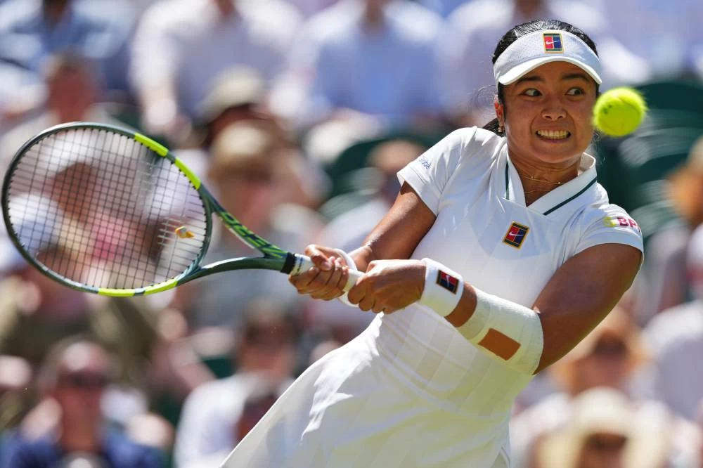 Alexandra Eala plays a return during the women's singles fourth round match against Jasmine Paolini. (AP)
