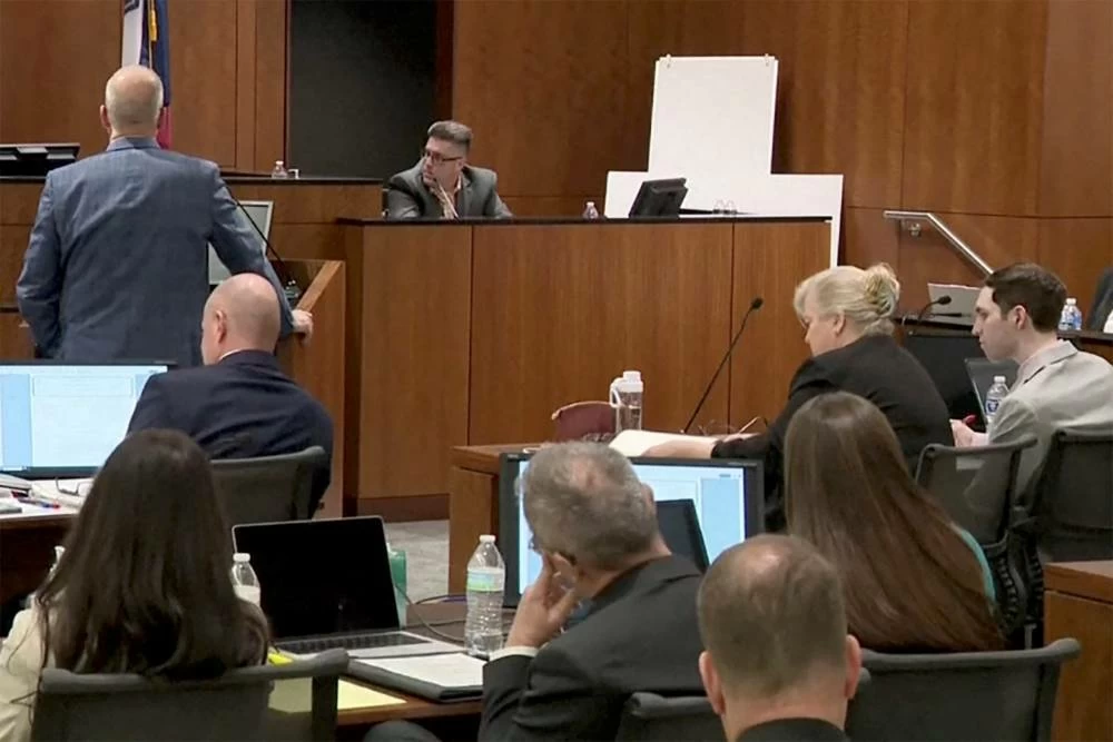 Tyler Robinson, the man accused of killing conservative activist Charlie Kirk, sits beside defense lawyer Kathryn Nester during a preliminary court hearing as Utah County prosecutor Chad Grunander questions David Hull, an investigator with the Utah Department of Safety, in Provo, Utah. (Reuters)