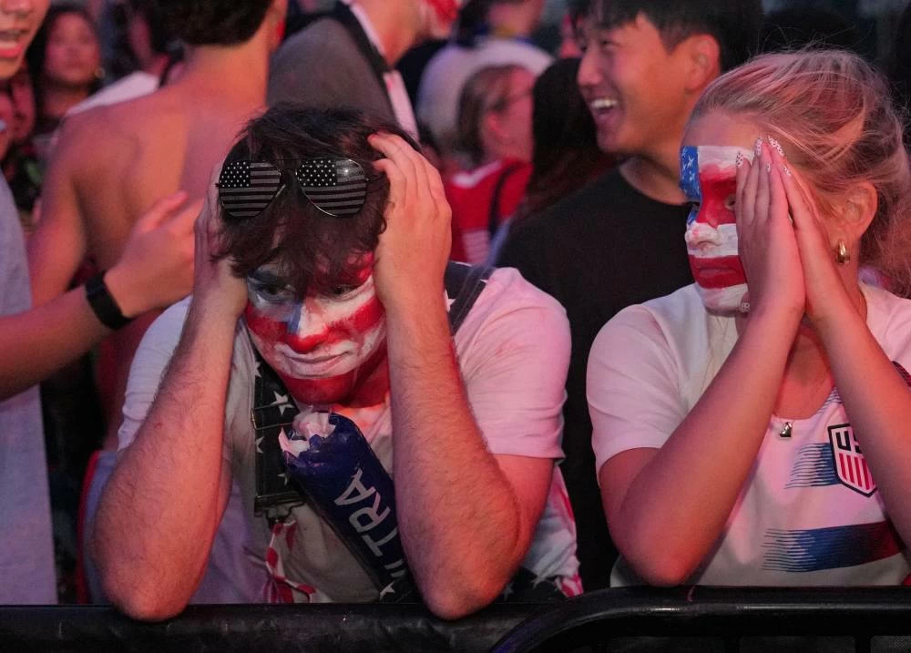 U.S. fans react while watching the match against Belgium in Portland. (Reuters)
