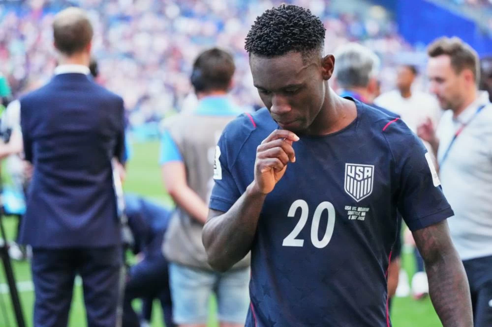 United States' Folarin Balogun (20) walks off the pitch after losing to Belgium in their World Cup round of 16 soccer match in Seattle, Monday, July 6, 2026. (AP)