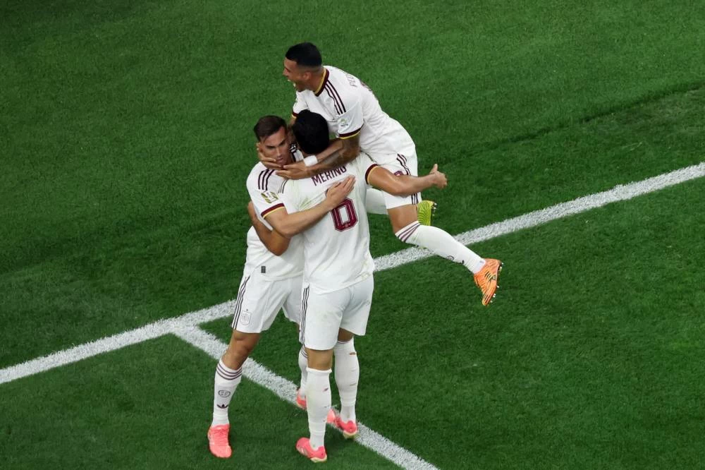 Spain's Mikel Merino (6) celebrates scoring their first goal during the World Cup round of 16 soccer match between Portugal and Spain in Arlington, Texas, near Dallas. Picture credit: AP