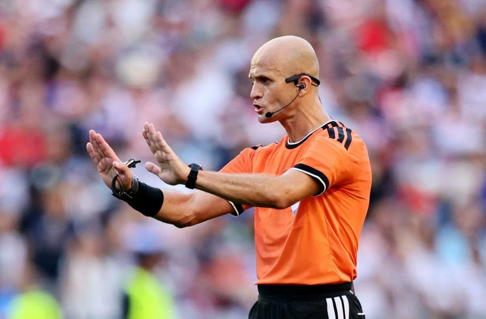 Referee Adham Makhadmeh during the match. Picture credit: Reuters
