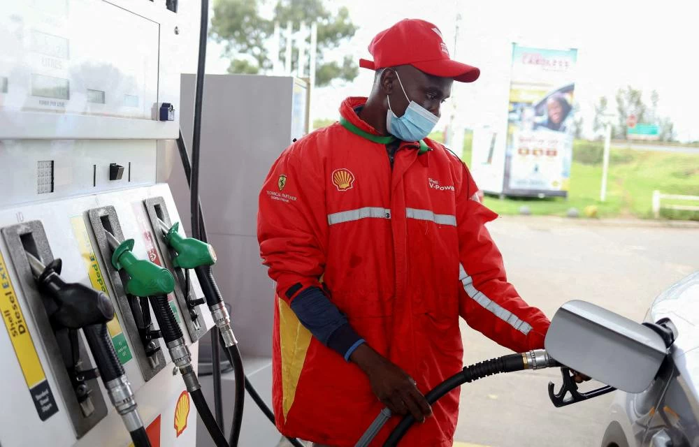 A worker fills a car at a fuel station in Johannesburg, South Africa. (Reuters file photo)