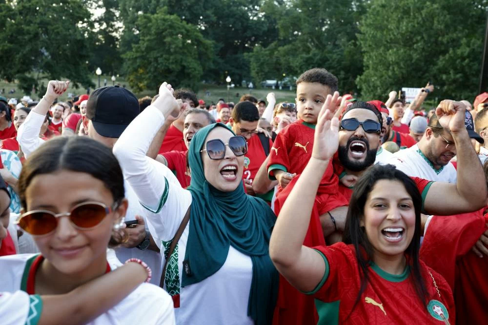 Morocco fans react as they gather on Boston Common ahead of their game against France. (Reuters)