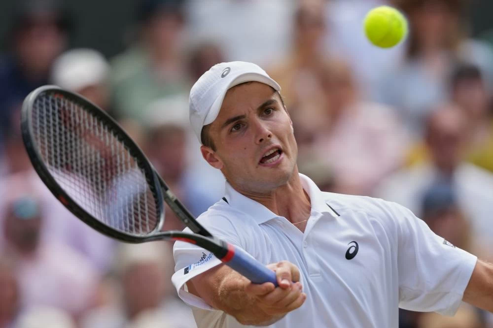 Arthur Fery of Britain plays a rerun to Alexander Zverev of Germany during their men's singles semifinal match at the Wimbledon Tennis Championships in London, Friday, July 10, 2026. (AP)