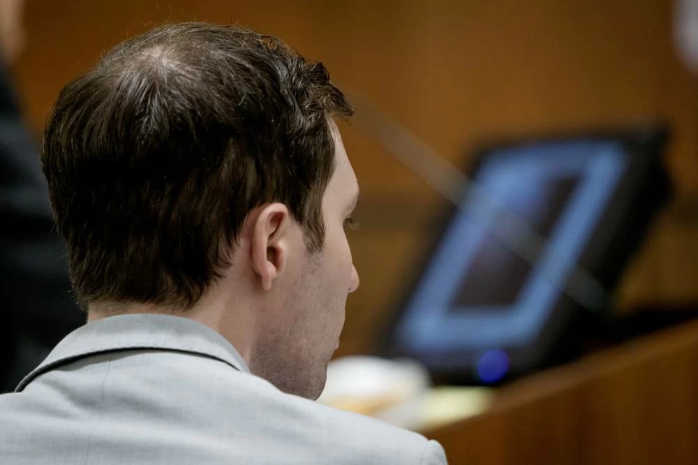 Tyler Robinson, who is accused in the fatal shooting of Charlie Kirk, watches a computer screen during testimony. (AP)