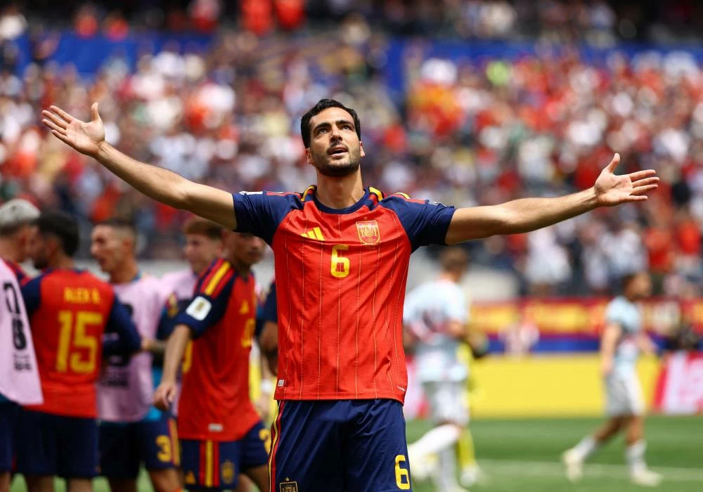 Spain's Mikel Merino celebrates scoring their second goal. Picture credit: Reuters