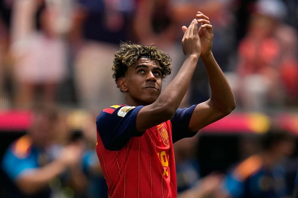 Spain's Lamine Yamal (19) celebrates at the end of the World Cup quarterfinal soccer match between Spain and Belgium in Inglewood, Calif. Picture credit: AP