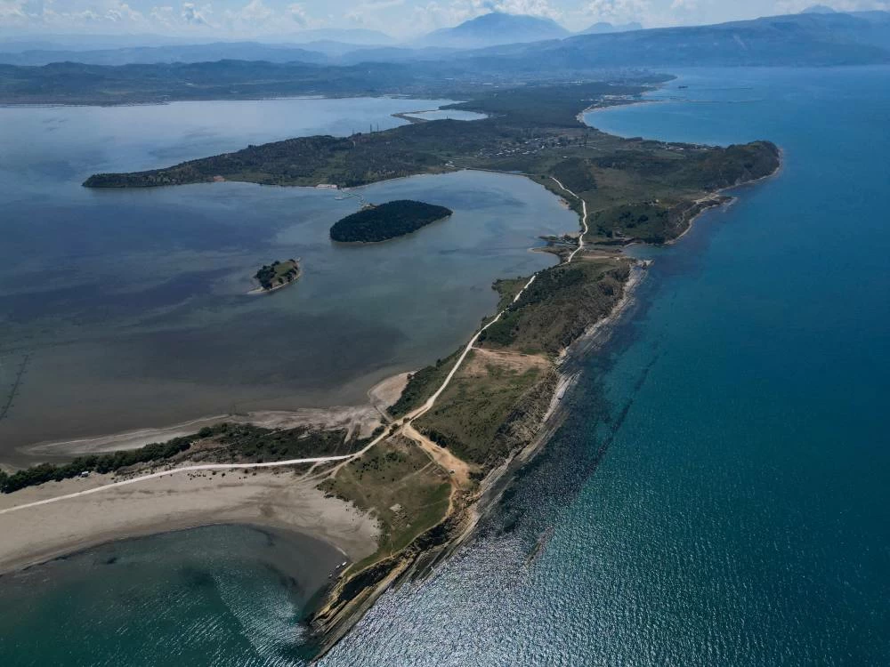 A drone view of a bay at the Vjosa-Narta Protected Area, where a luxury resort is planned by a company linked to Donald Trump's son-in-law, Jared Kushner, in Zvernec near Vlora, Albania, June 10, 2026. REUTERS