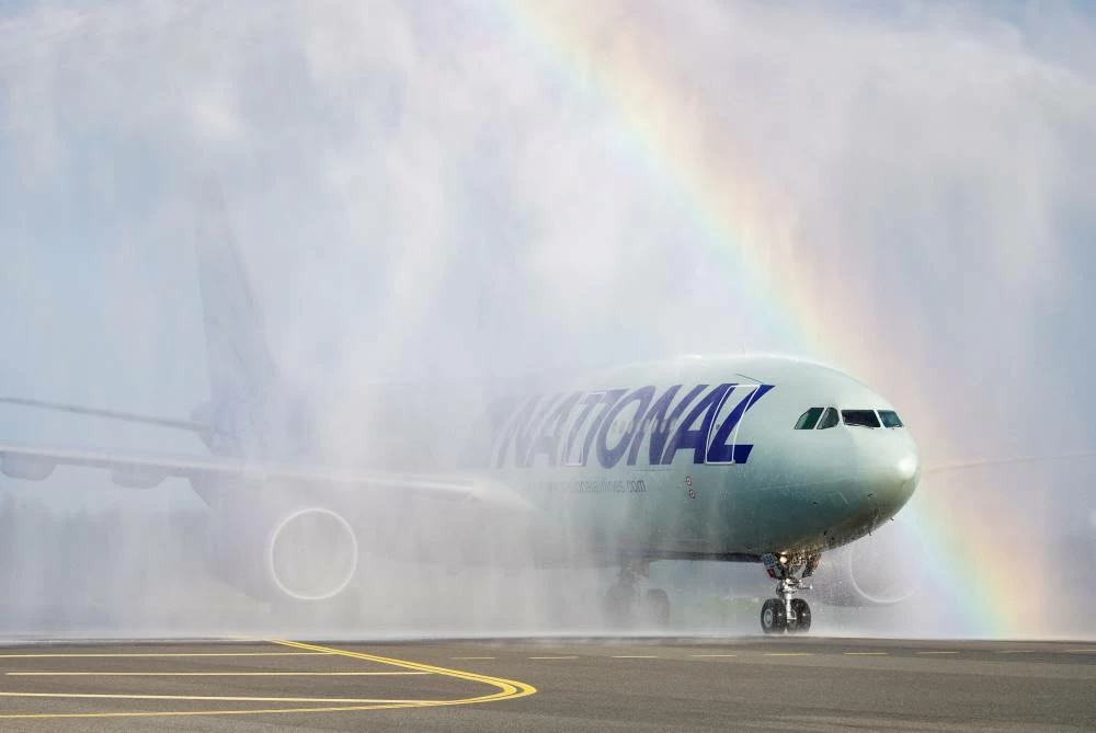 The Norwegian national football team's plane is being sprayed with water after landing at Oslo Airport, in Gardermoen, Norway. Picture credit: AP
