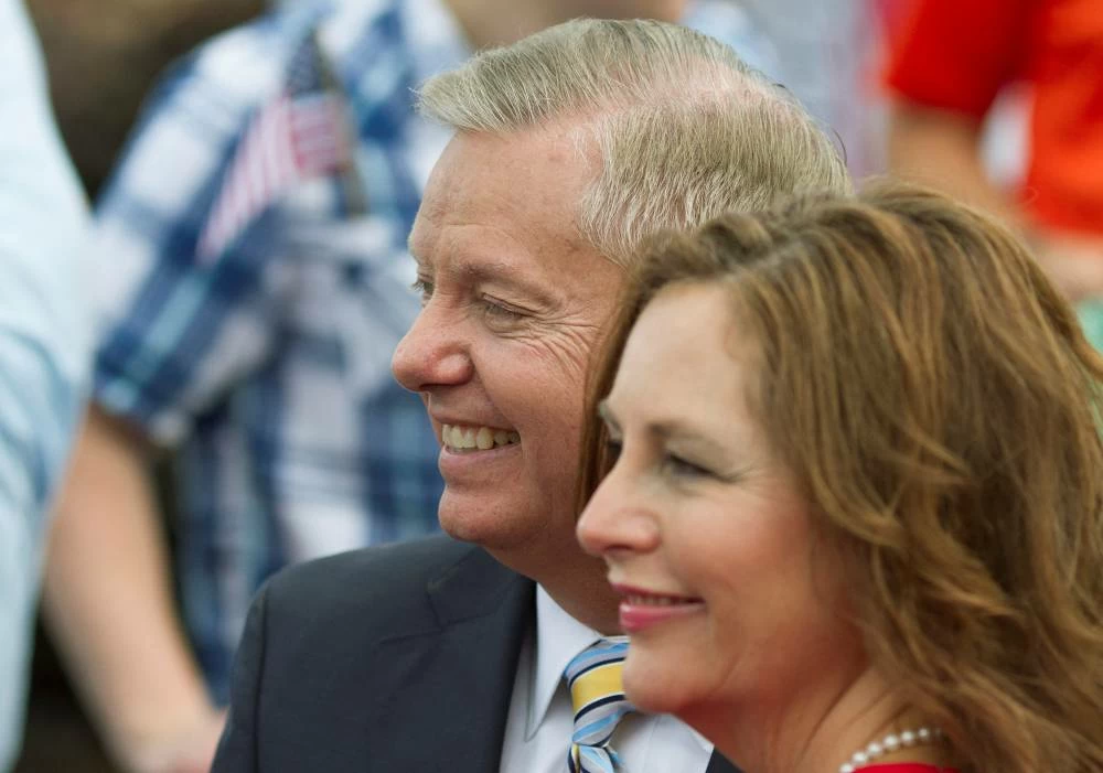 U.S. Senator Lindsey Graham stands with his sister Darline Graham Nordone after formally announcing his campaign for the 2016 Republican presidential nomination in his hometown Central, South Carolina June 1, 2015. Reuters