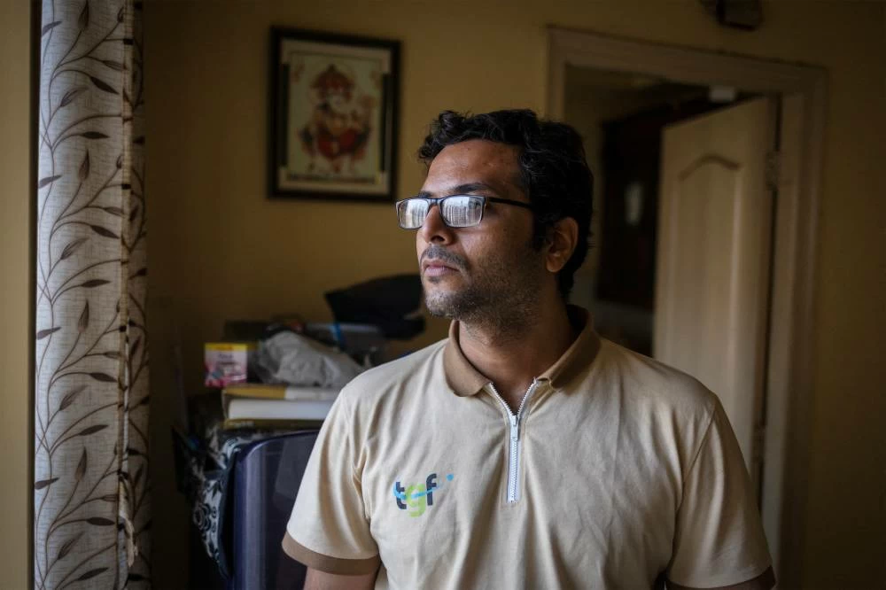 Dev Kotak, a reporter with the television channel Times Now, who was assaulted at the ongoing protest site of Cockroach Janata Party (CJP), poses for a picture inside his house in Noida, India, July 23, 2026. Reuters