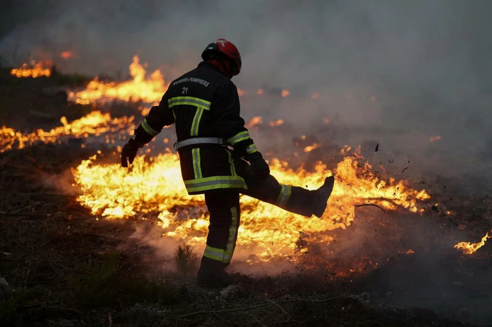 Wildfires close in on Bordeaux as France and Spain battle massive blazes