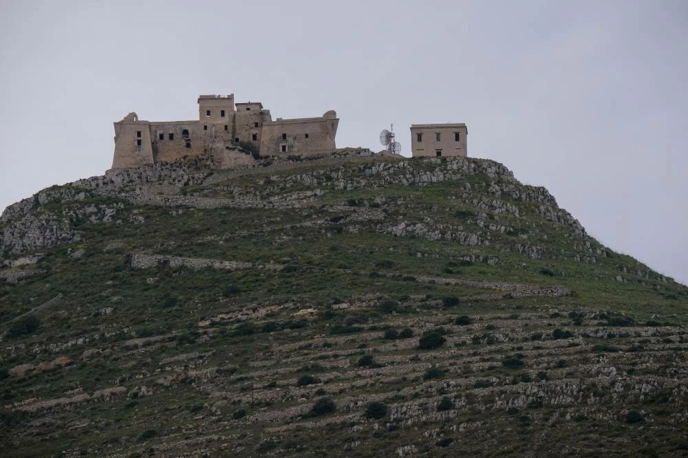 The Castello di Santa Caterina stands on a hill above Favignana, Italy, as seen on May 5, 2021. (Reuters)