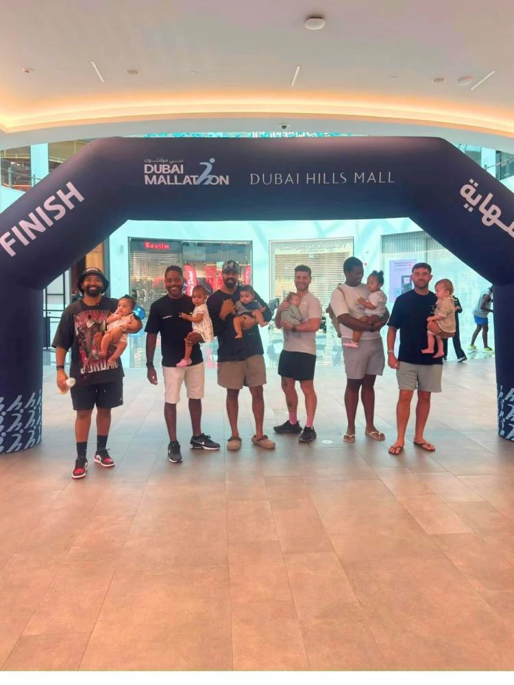 Lukhie Songwiqi (left-most), with members of the Dad Club DXB, enjoyed themselves at the Mallathon. Picture credit: Supplied