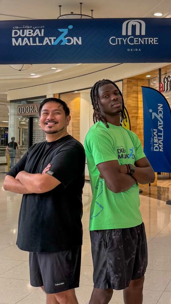 Mico Banua (left) said the Mallathon's coaches were incredibly helpful, and helped participants warm up and cool down. Picture credit: Supplied