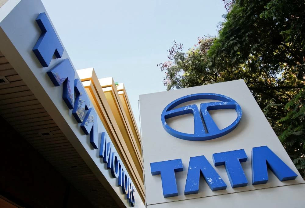 Tata Motors logos are pictured outside their flagship showroom in Mumbai May 28, 2013. REUTERS/Vivek Prakash