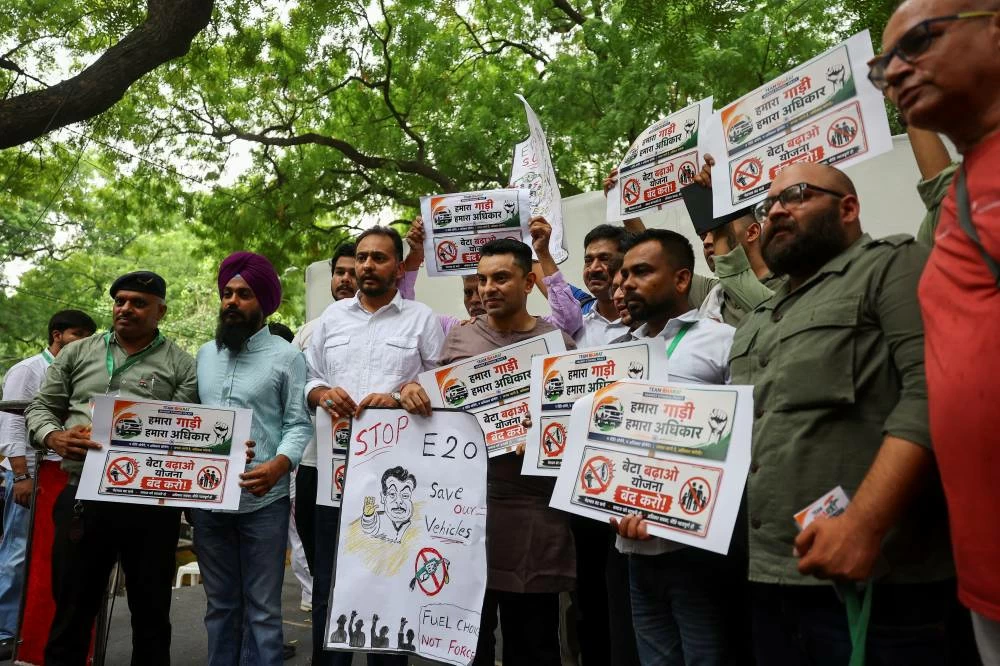Activists of India's Congress party holds posters while taking part in a protest against the rollout of the E20 ethanol fuel-blending policy at Jantar Mantar in New Delhi, India, July 5, 2026. (Reuters)