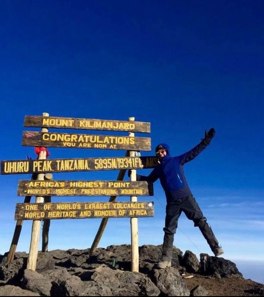 Bullied as a child for carrying an asthma inhaler, Dhiren Harchandani later proved to himself what his body was capable of by reaching the summit of Mount Kilimanjaro. 
Photo credit: Supplied