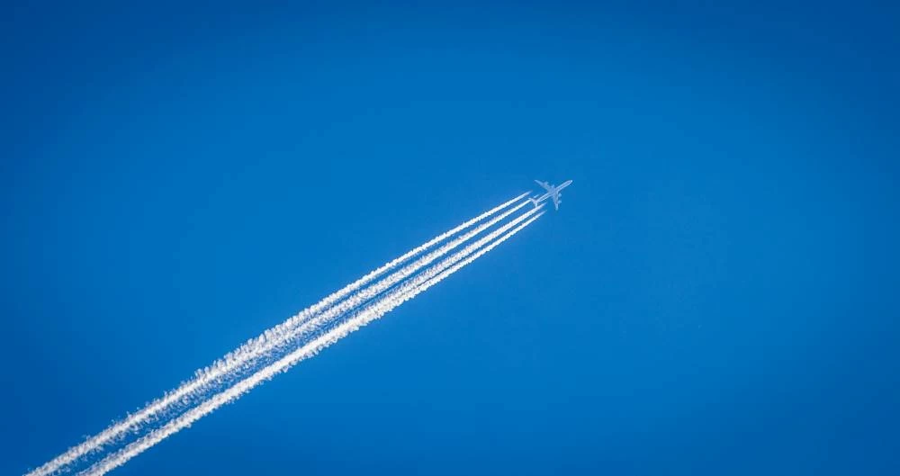 When airplanes fly through cold and humid areas, ice crystals can form around the soot particles emitted from the engine, creating clouds that trap heat and warm the planet. Picture for illustrative purposes. Picture credit: Unsplash