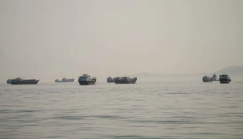 File photo: Vessels are anchored in the Strait of Hormuz, as seen from Musandam, Oman, June 19, 2026. REUTERS
