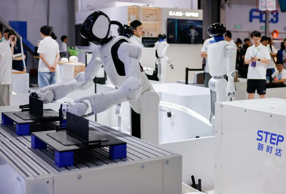 Industrial humanoid robots on display at the Haier STEP booth at the 2026 World Robot Conference, in Beijing, China, August 19, 2026. (Reuters)