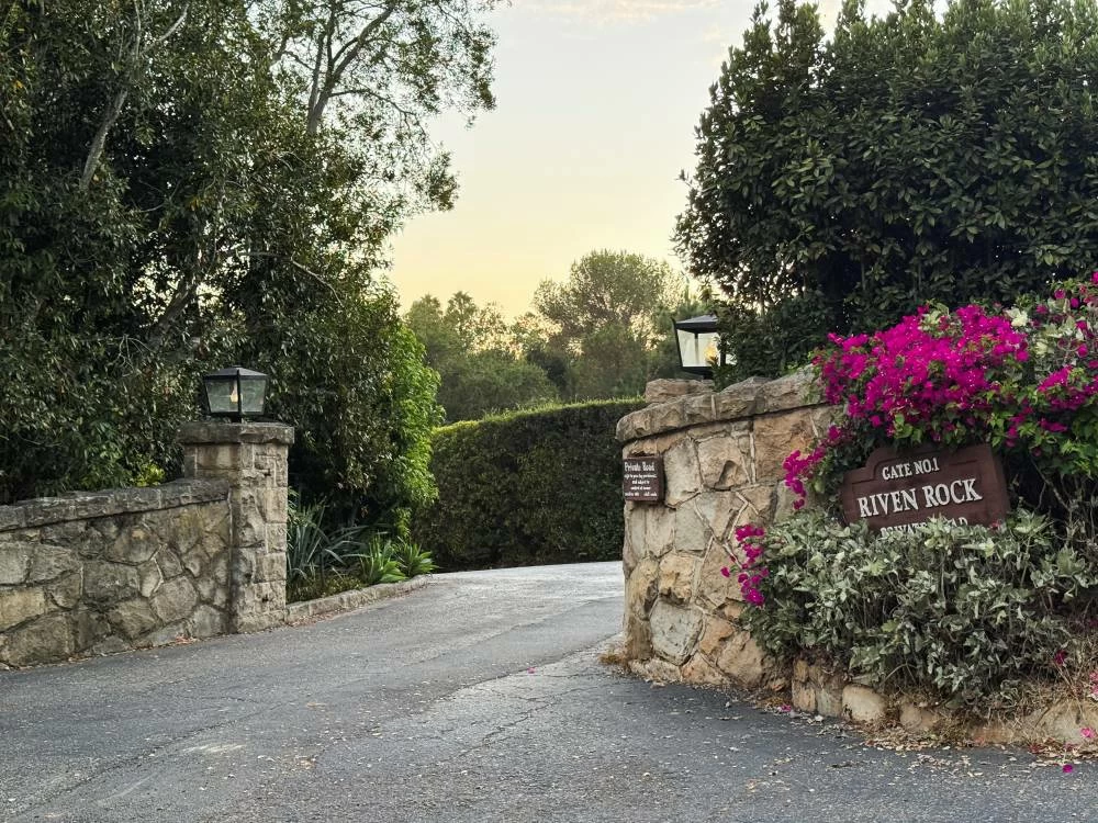 A general view of the entryway to a private road leading to Britain's Prince Harry's and his wife, Duchess of Sussex Meghan's home in Montecito, California, U.S., August 19, 2026. (Reuters)