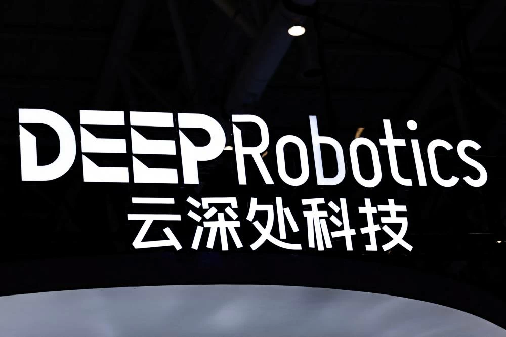 A sign of Deep Robotics at the company's booth during the 2026 World Robot Conference, in Beijing, China August 19, 2026 (Reuters)