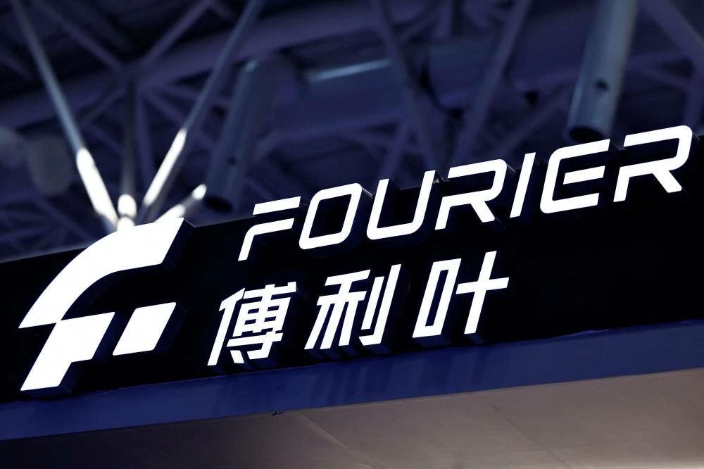 A logo of Fourier Intelligence at its booth during the 2026 World Robot Conference, in Beijing, China August 19, 2026.(Reuters)