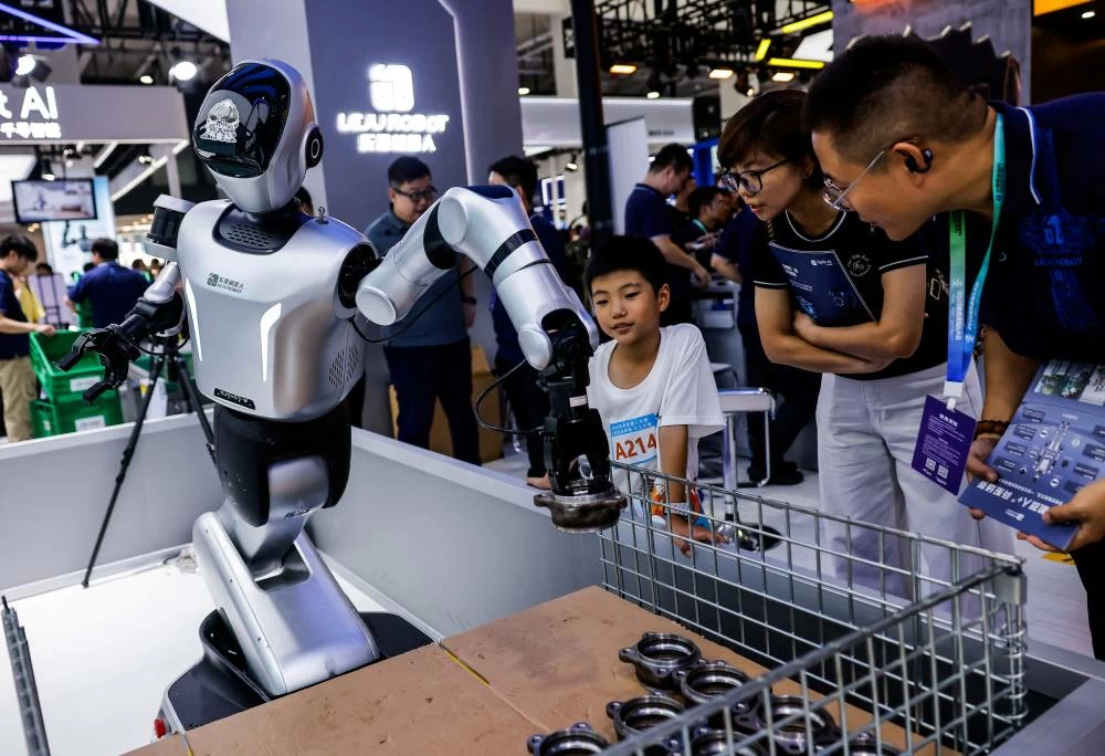 People look at the demonstration of Kuavo 5-W robot at the Leju Robotics booth at the 2026 World Robot Conference, in Beijing, China, August 19, 2026. (Reuters)