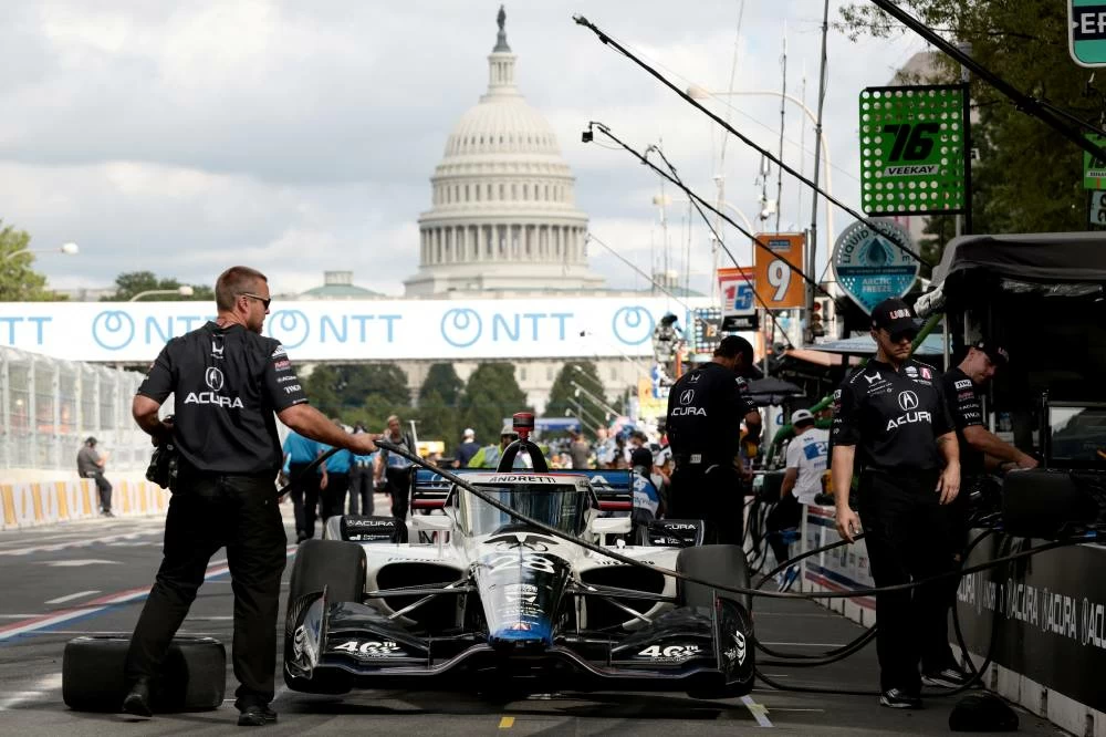 A pit crew prepares an IndyCar for the qualifying race ahead of Freedom 250 Grand Prix IndyCar series race in Washington D.C., U.,S. REUTERS