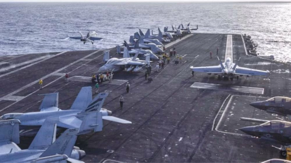 American fighter jets on the deck of the aircraft carrier Abraham Lincoln. Picture credit: Reuters