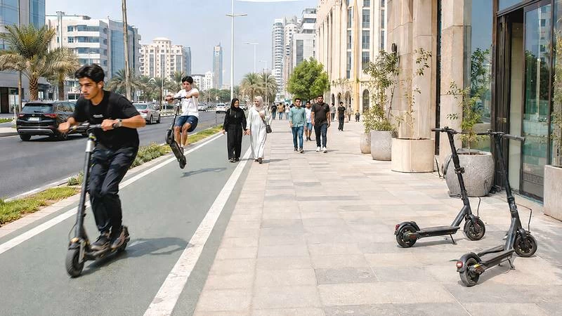 Abu Dhabi Police stressed the need to drive e-scooters carefully in crowded areas, give way to pedestrians, avoid overtaking and dangerous stunts, and give priority to road users. Picture credit: AI-generated image
