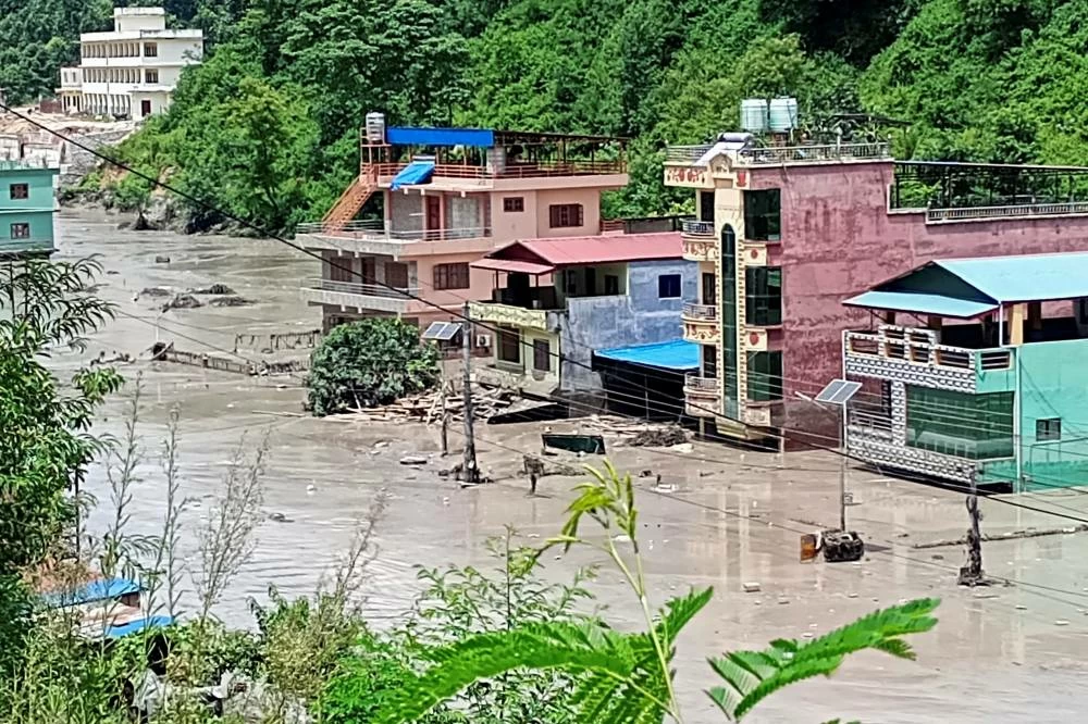 A flooded road following a flash flood in Galchhi in the Dhading district, Nepal, August 26, 2026. Picture credit: Reuters