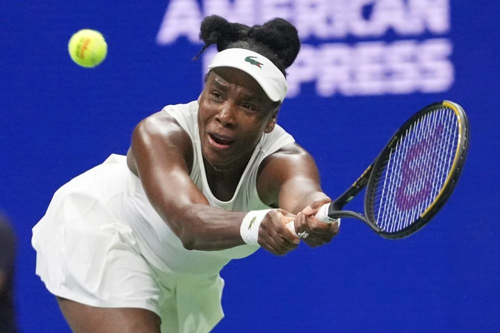Venus Williams, of the United States, plays a backhand return to compatriot Sofia Kenin, of the United States during their first-round match at the U.S. Open tennis championships, Monday, Aug. 31, 2026, in New York. AP