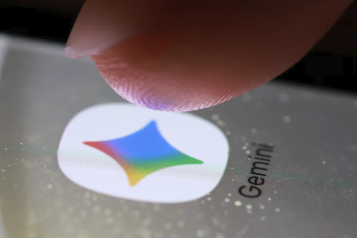 The Gemini app icon on a smartphone. (Reuters file photo)