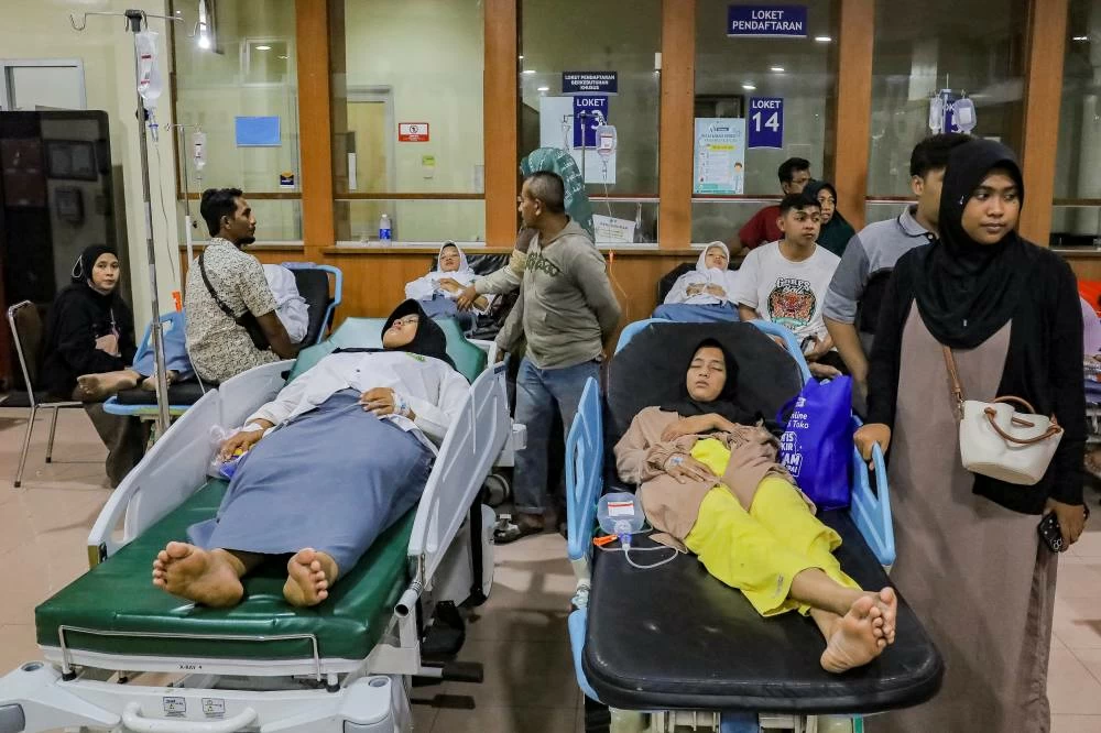 Indonesia rights body calls for police probe into poisoning of 2,000 students