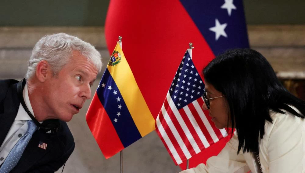 U.S. Energy Secretary Chris Wright speaks with Venezuelan acting President Delcy Rodriguez at Miraflores Palace on the day of the signing of an agreement between U.S. oil major Chevron and government officials to expand the company's operations, in Caracas, Venezuela, September 2, 2026. (Reuters)