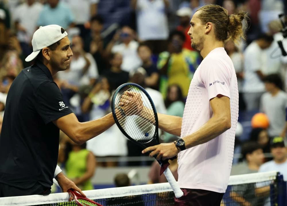 Germany's Alexander Zverev shakes hands with Chile's Alejandro Tabilo after winning his third round match. Reuters
