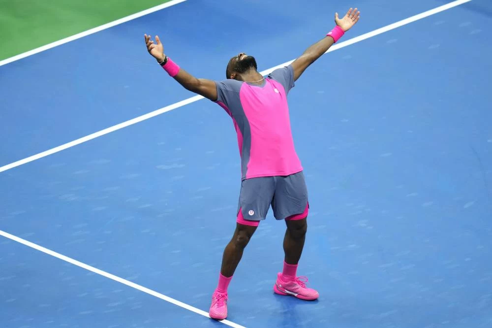 Frances Tiafoe, of the United States, celebrates winning a match against Alex Michelsen, of the United States, during the quarterfinal round of the U.S. Open tennis championships, Tuesday, September 8, 2026, in New York.
Photo credit: Kirsty Wigglesworth/AP